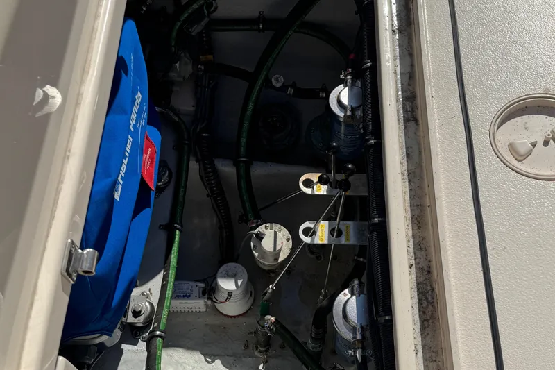 Slide: The Image of Engine compartment of 2024 Grady-White Marlin 300 with Fischer Panda generator cover. - 53