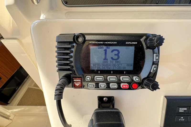 Slide: The Image of Fusion stereo system on 2024 Grady-White Marlin 300 boat dashboard. - 68