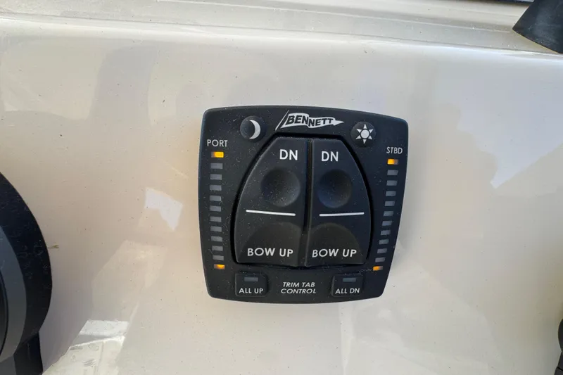 Slide: The Image of Standard Horizon Explorer radio on 2024 Grady-White Marlin 300 boat dashboard. - 69