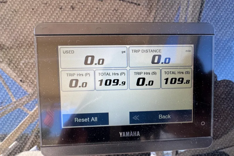 Slide: The Image of Control panel on 2024 Grady-White Marlin 300 boat with Yamaha navigation buttons. - 73