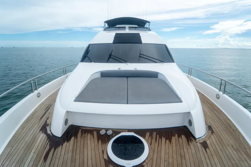 Slide: The Image of 2008 Lazzara 84 Open Bridge yacht on calm ocean waters, showcasing sleek design. - 25