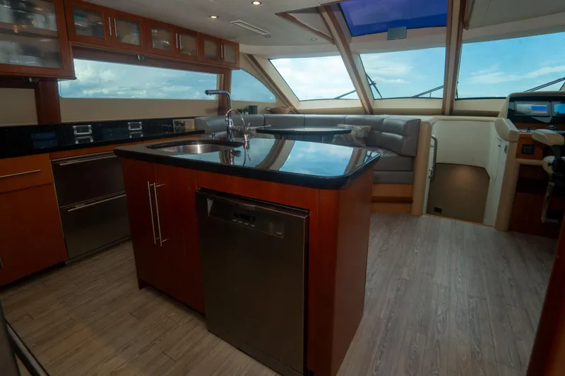 Slide: The Image of Luxurious 2008 Lazzara 84 Open Bridge yacht interior with modern kitchen and seating area. - 32