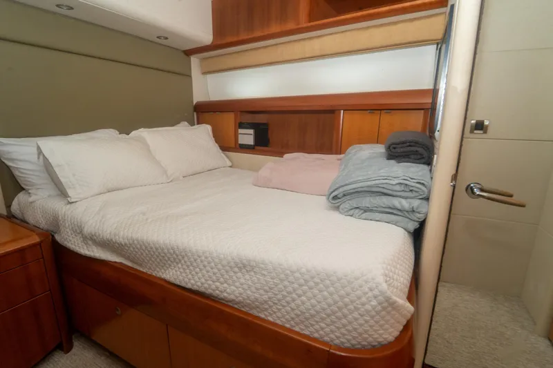 Slide: The Image of Luxurious bedroom interior on 2008 Lazzara 84 Open Bridge yacht, featuring cozy bedding. - 43