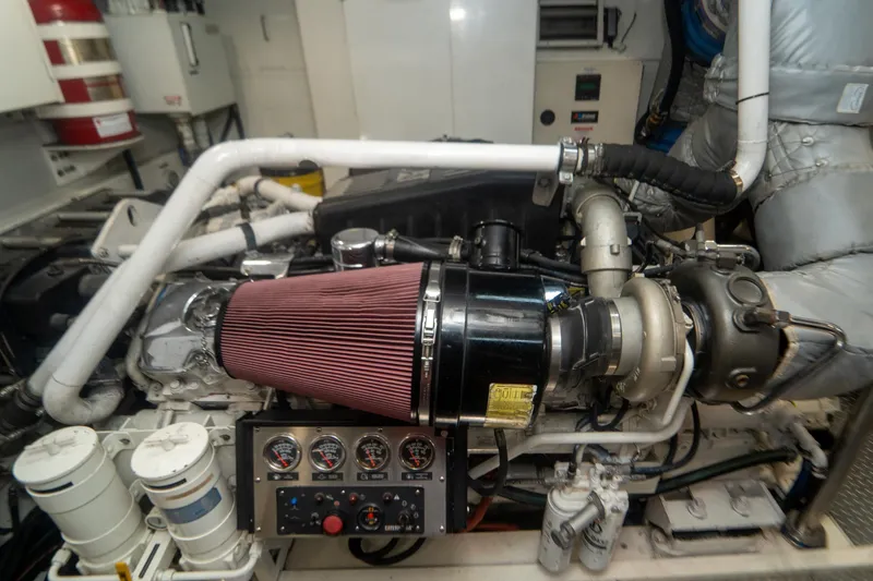 Slide: The Image of Engine room of 2008 Lazzara 84 Open Bridge yacht, showcasing mechanical components. - 46