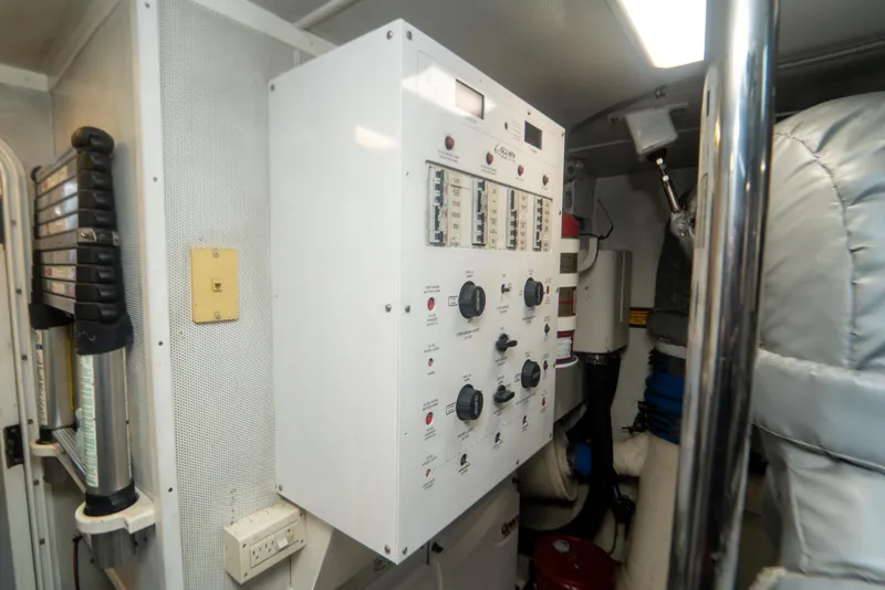Slide: The Image of Control panel in the engine room of a 2008 Lazzara 84 Open Bridge yacht. - 48