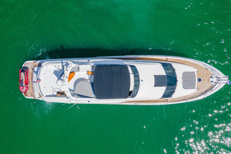 Slide: The Image of Aerial view of 2008 Lazzara 84 Open Bridge yacht on green water. - 7