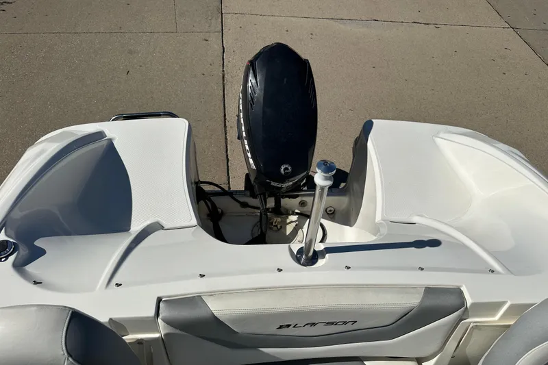 Slide: The Image of 2013 Larson LX 180S OB boat with outboard motor, viewed from above. - 12