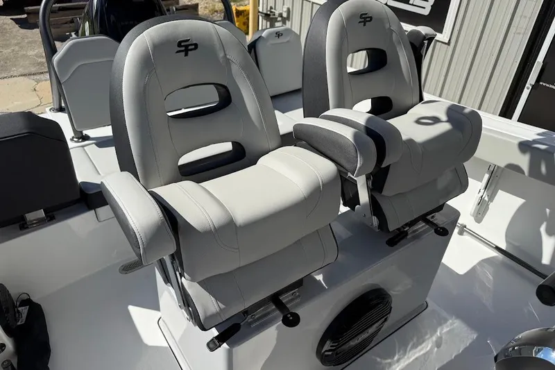 Slide: The Image of 2026 Sea Pro 245FLX Sandbar boat seats with armrests and logo. - 16