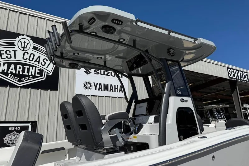 Slide: The Image of 2026 Sea Pro 245FLX Sandbar boat at West Coast Marine dealership. - 5