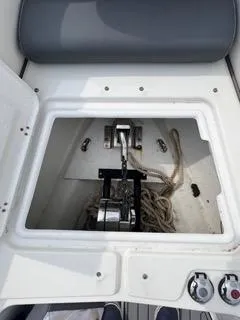 Slide: The Image of 2026 Brig Eagle 8 boat anchor compartment with ropes and winch. - 24
