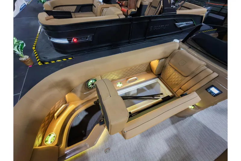 Slide: The Image of Luxurious interior of 2026 Godfrey SanPan 25' Split Bench Co-Captain pontoon boat. - 16