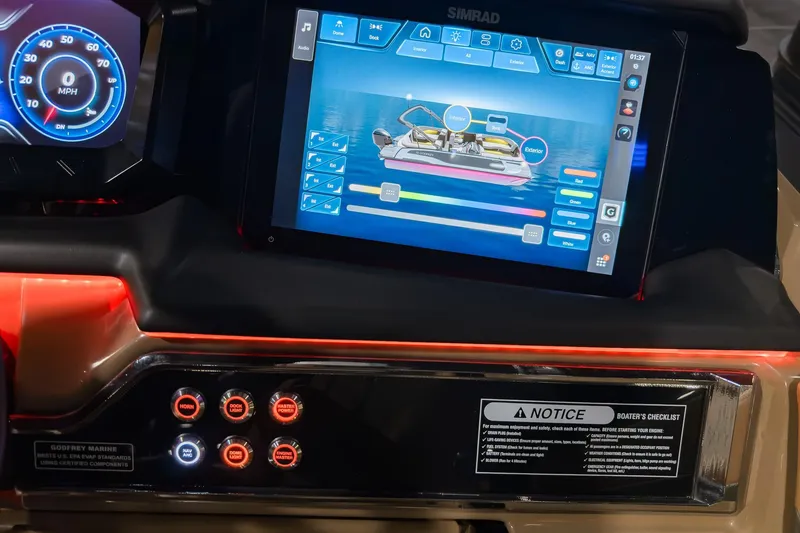 Slide: The Image of Dashboard of 2026 Godfrey SanPan 25' Split Bench Co-Captain with touchscreen controls. - 25