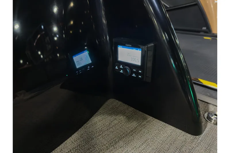 Slide: The Image of Control panel on 2026 Godfrey SanPan 25' Split Bench Co-Captain boat interior. - 40