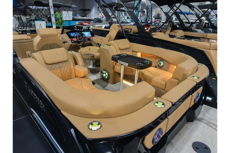 Slide: The Image of Luxurious 2026 Godfrey SanPan 25' Split Bench Co-Captain boat interior with plush seating and modern amenities. - 8