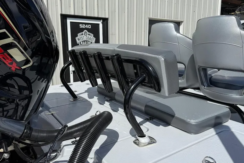 Slide: The Image of 2026 Blazer 675 Ultimate Bay boat interior with seating and motor details. - 16