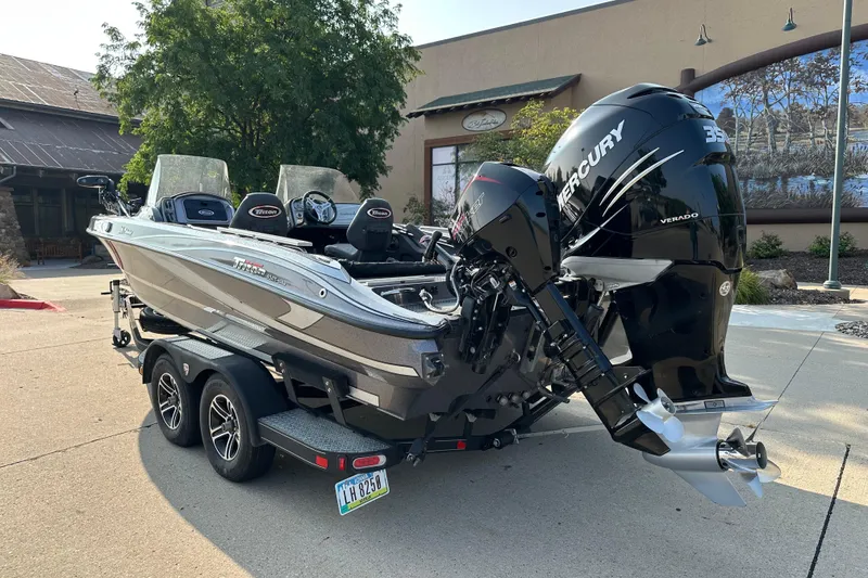 Slide: The Image of 2018 Triton 216 Fishunter boat with Mercury Verado engine on a trailer. - 3