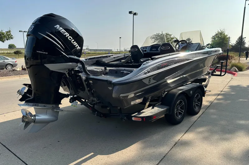 Slide: The Image of 2018 Triton 216 Fishunter boat with Mercury Verado engine on a trailer. - 5
