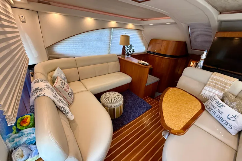 Slide: The Image of Luxurious interior of 2006 Tiara Yachts 3900 Convertible with elegant seating and decor. - 10