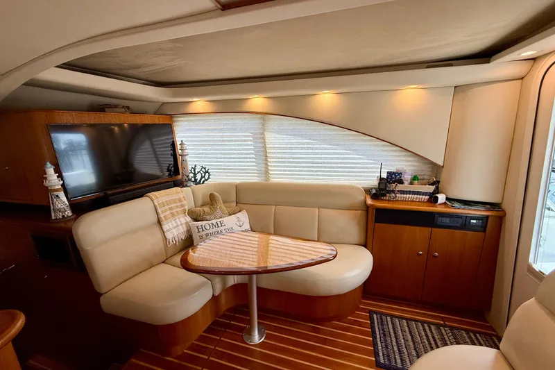 Slide: The Image of Luxurious interior of 2006 Tiara Yachts 3900 Convertible with cozy seating and elegant decor. - 12