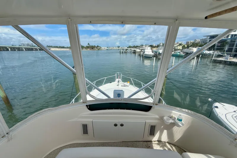 Slide: The Image of View from 2006 Tiara Yachts 3900 Convertible, overlooking marina and waterfront buildings. - 39