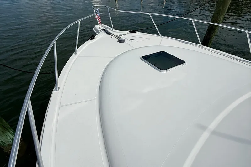 Slide: The Image of 2006 Tiara Yachts 3900 Convertible bow view with railing and hatch. - 40