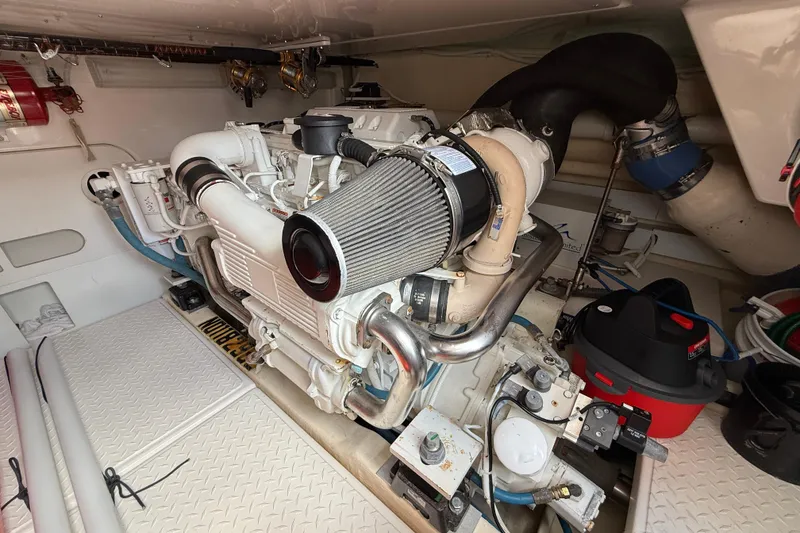 Slide: The Image of Engine room of a 2006 Tiara Yachts 3900 Convertible, showcasing detailed machinery. - 45