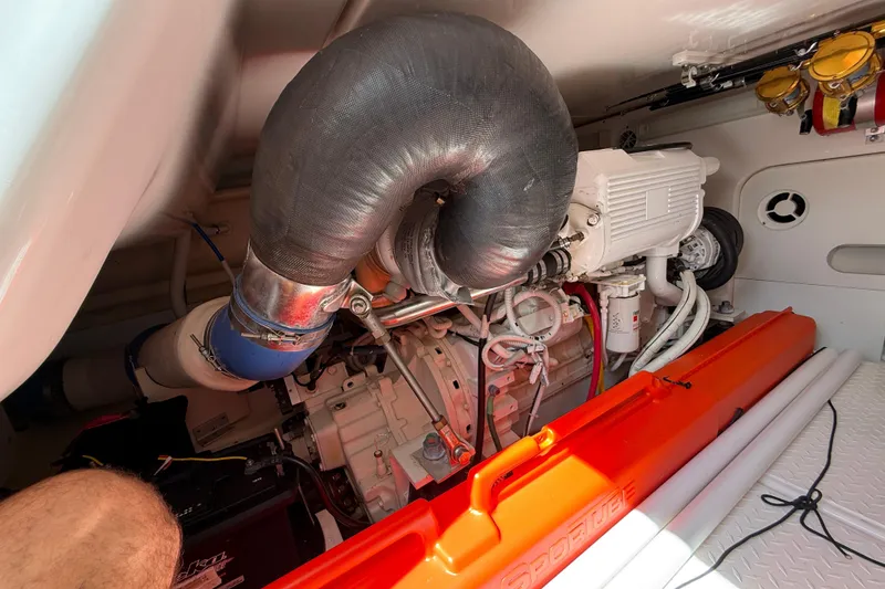 Slide: The Image of Engine room of 2006 Tiara Yachts 3900 Convertible, featuring detailed mechanical components. - 48