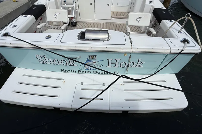 Slide: The Image of 2006 Tiara Yachts 3900 Convertible docked, featuring "Shook the Hook" nameplate, North Palm Beach, FL. - 5