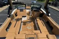 Slide: The Image of 2025 MasterCraft X24 boat interior with luxurious tan seating and modern design. - 21