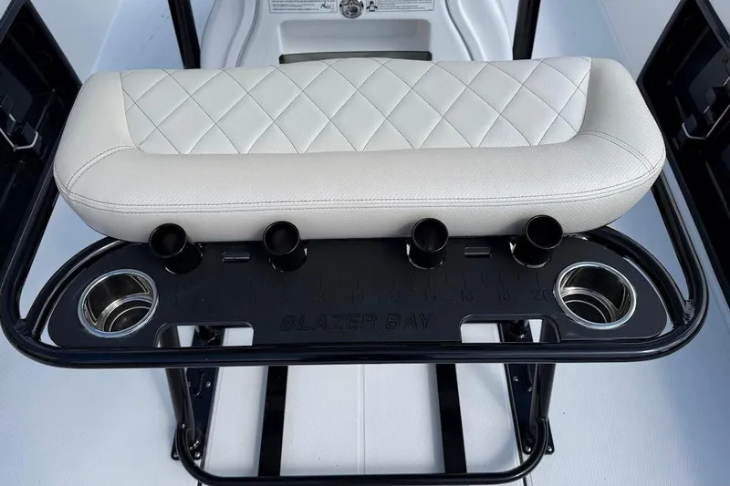 Slide: The Image of 2026 Blazer PureBay 2400 boat seat with cup holders and rod holders. - 12