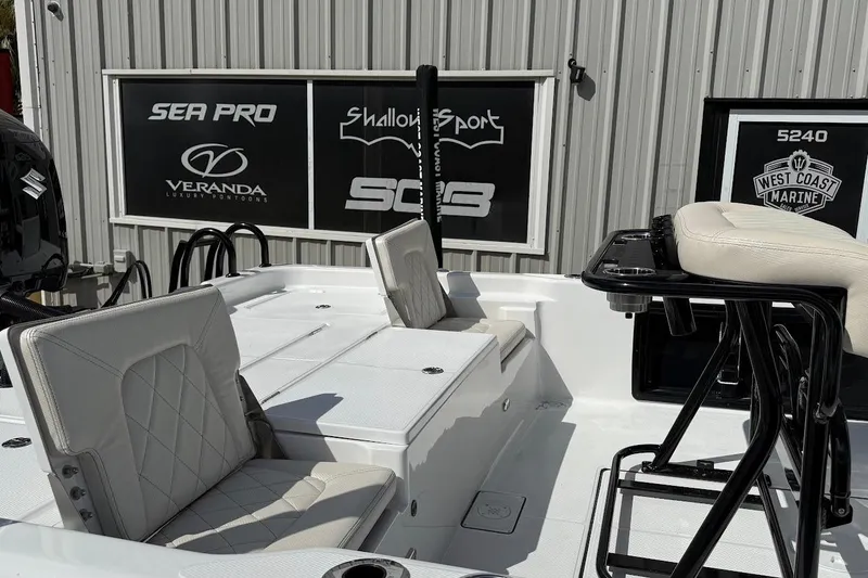 Slide: The Image of 2026 Blazer PureBay 2400 boat interior with white seating and black accents. - 5