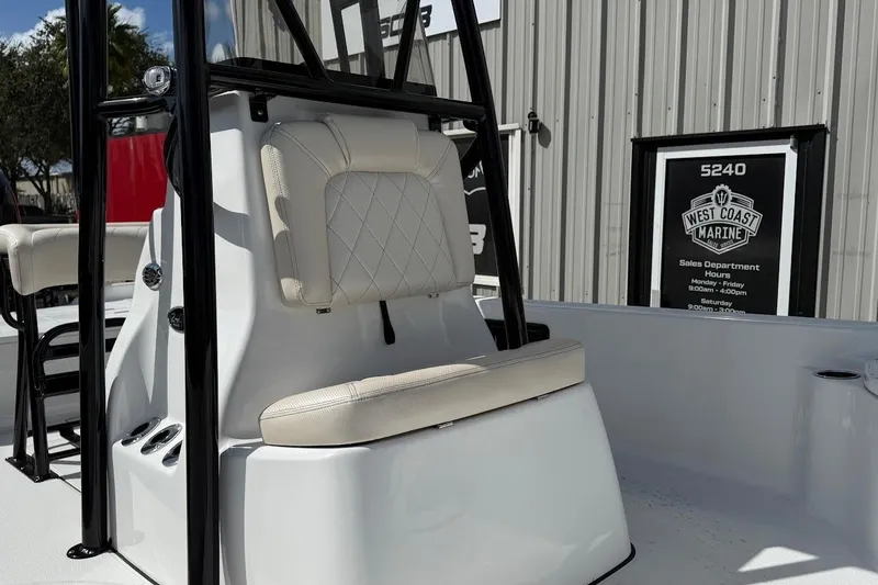 Slide: The Image of 2026 Blazer PureBay 2400 boat interior with cushioned seating at West Coast Marine. - 8
