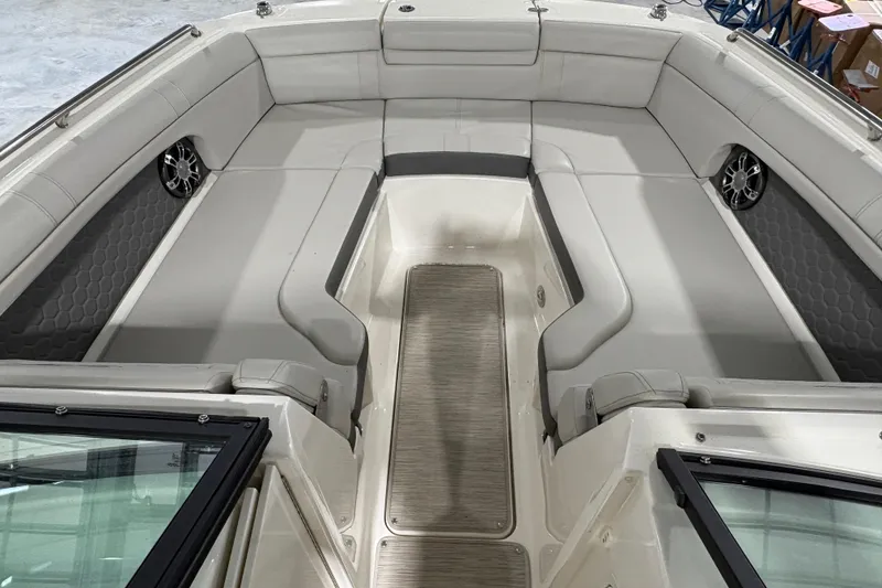 Slide: The Image of 2022 Sea Ray SDX 270 Outboard interior bathroom with sink and toilet. - 13