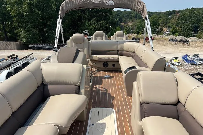 Slide: The Image of Luxurious 2018 SunChaser 326 pontoon boat with spacious seating and elegant design. - 6