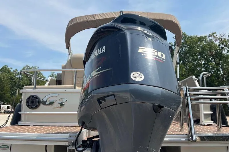 Slide: The Image of 2018 SunChaser 326 boat with Yamaha 250 outboard motor, docked outdoors. - 7