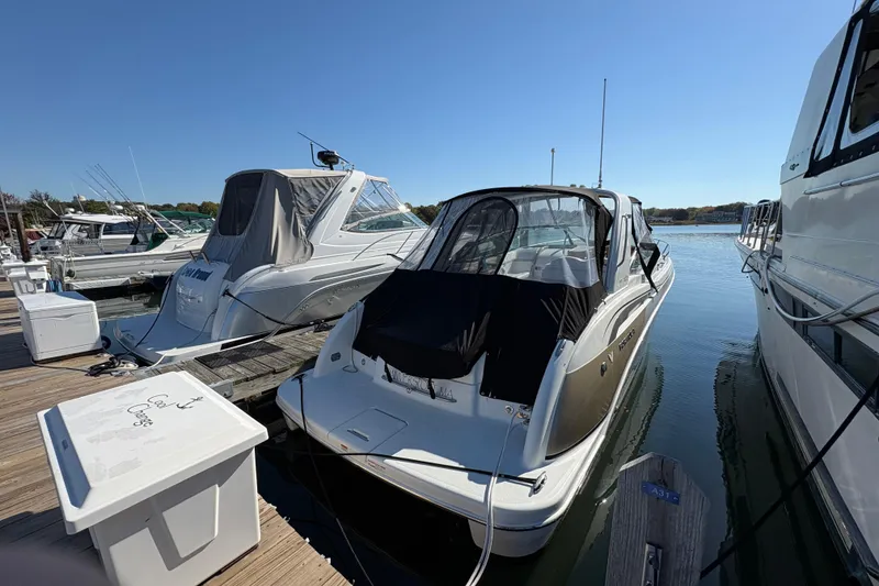 Slide: The Image of 2008 Formula 350 Sun Sport docked at marina under clear blue sky. - 3