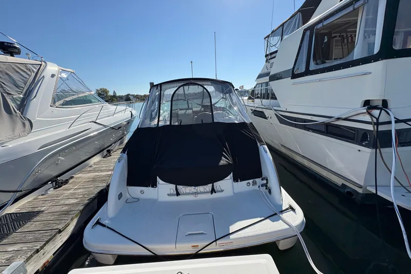 Slide: The Image of 2008 Formula 350 Sun Sport docked between two boats on a sunny day. - 5
