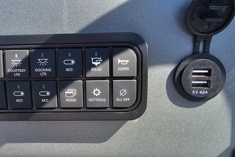 Slide: The Image of Control panel of 2026 Sun Tracker Party Barge 22 RF XP3 with USB ports. - 11