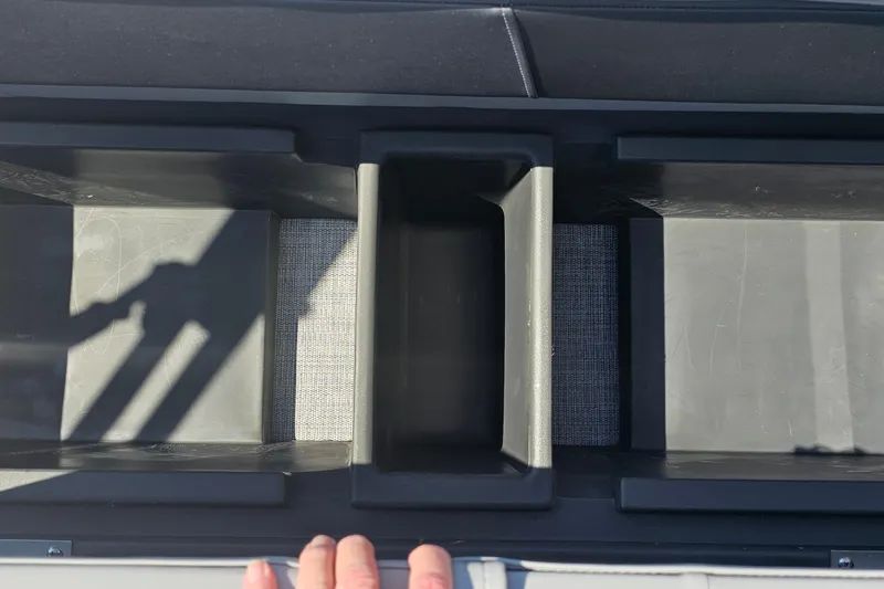 Slide: The Image of Storage compartments on a 2026 Sun Tracker Party Barge 22 RF XP3 boat. - 17
