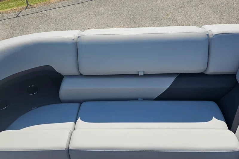 Slide: The Image of 2026 Sun Tracker Party Barge 22 RF XP3 boat seating, featuring sleek gray upholstery. - 6