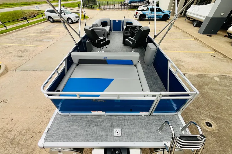 Slide: The Image of 2026 Sun Tracker Party Barge 22 RF DLX pontoon boat with spacious seating and modern design. - 10