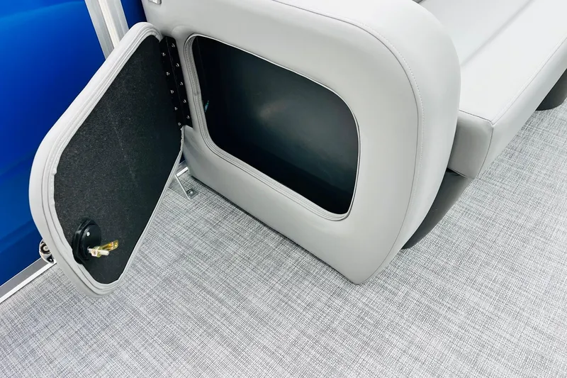 Slide: The Image of Open storage compartment on 2026 Sun Tracker Party Barge 22 RF DLX pontoon boat. - 15
