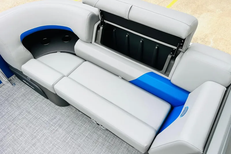 Slide: The Image of 2026 Sun Tracker Party Barge 22 RF DLX interior seating with storage compartment. - 24