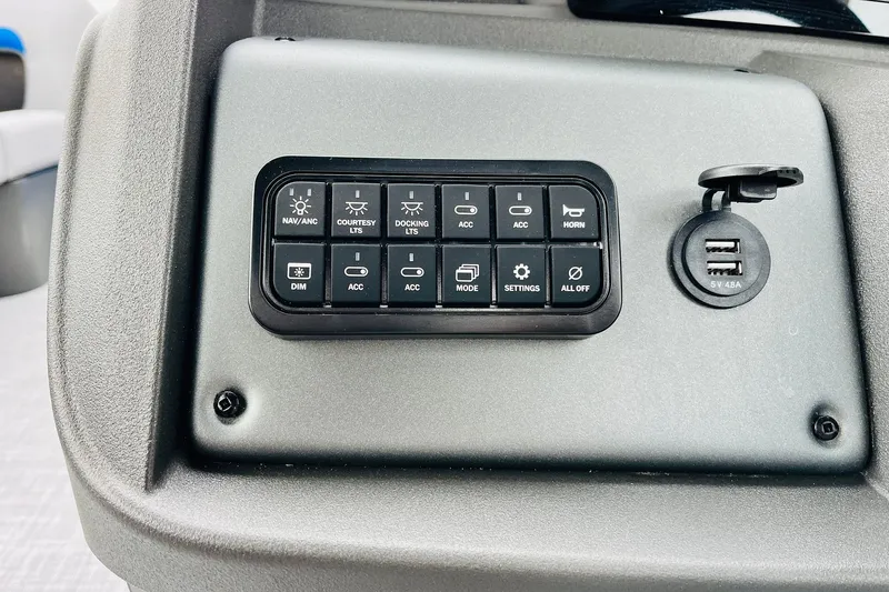 Slide: The Image of Control panel of 2026 Sun Tracker Party Barge 22 RF DLX with USB ports. - 33