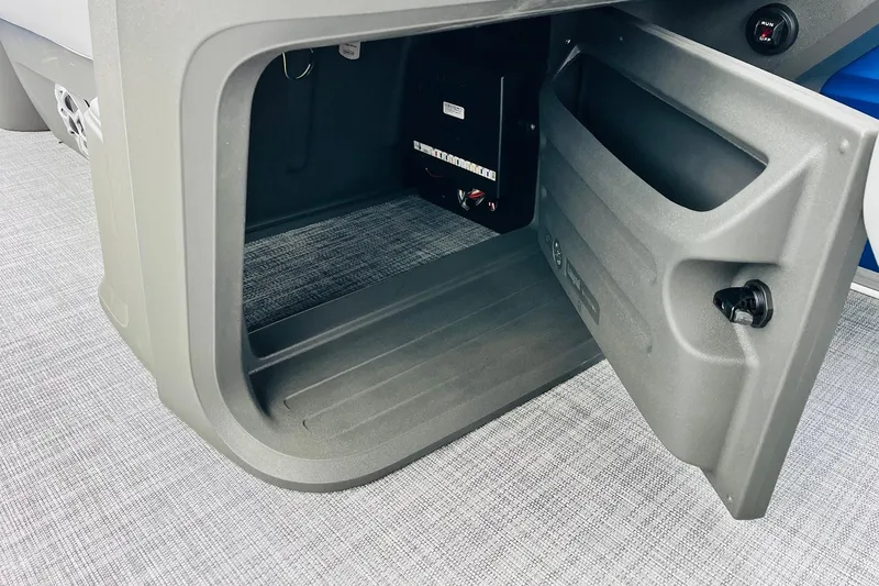 Slide: The Image of Open storage compartment on 2026 Sun Tracker Party Barge 22 RF DLX. - 35