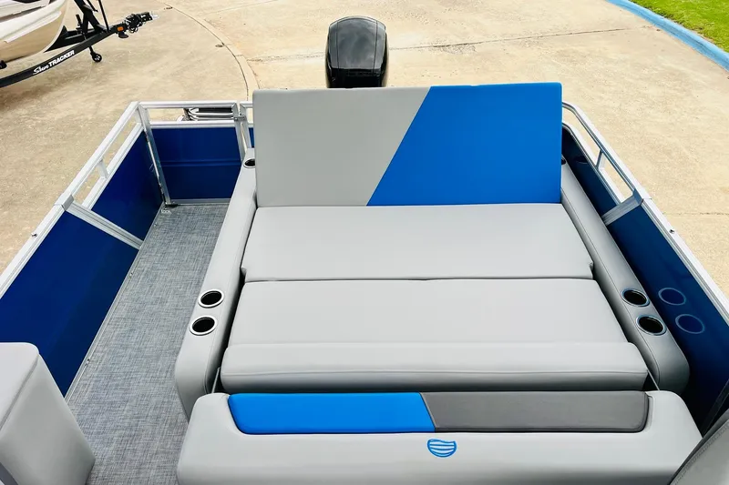 Slide: The Image of 2026 Sun Tracker Party Barge 22 RF DLX with spacious seating and cup holders. - 44