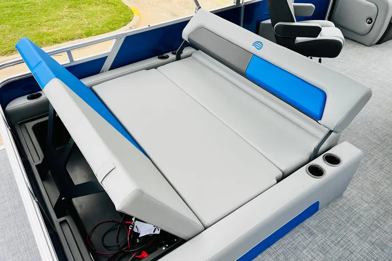 Slide: The Image of 2026 Sun Tracker Party Barge 22 RF DLX interior seating with cup holders. - 52