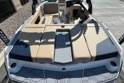 Slide: The Image of 2025 MasterCraft NXT20 boat with spacious seating and modern design. - 10