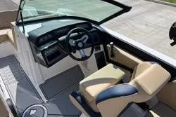 Slide: The Image of 2025 MasterCraft NXT20 boat interior with modern dashboard and seating. - 7