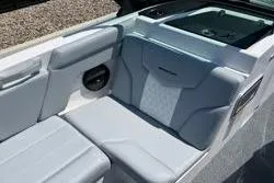 Slide: The Image of 2025 MasterCraft XT22 boat interior with sleek gray seating and modern design. - 21